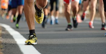 Runners' feet on pavement