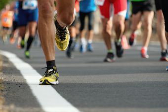 Runners' feet on pavement